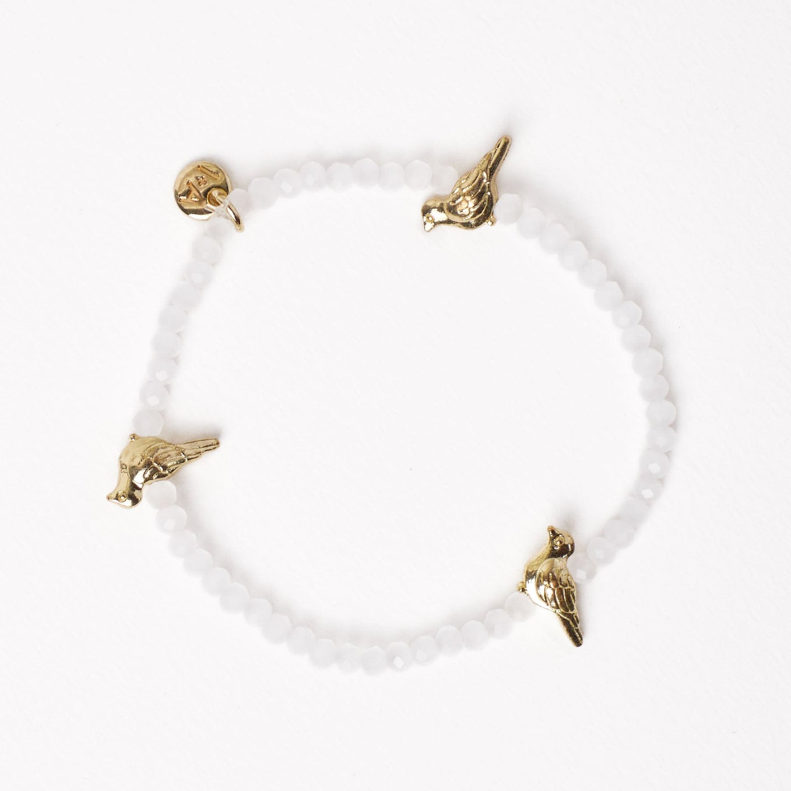 Janie Crystal Stretch Bracelet With Brass Bird Charms White Wholesale