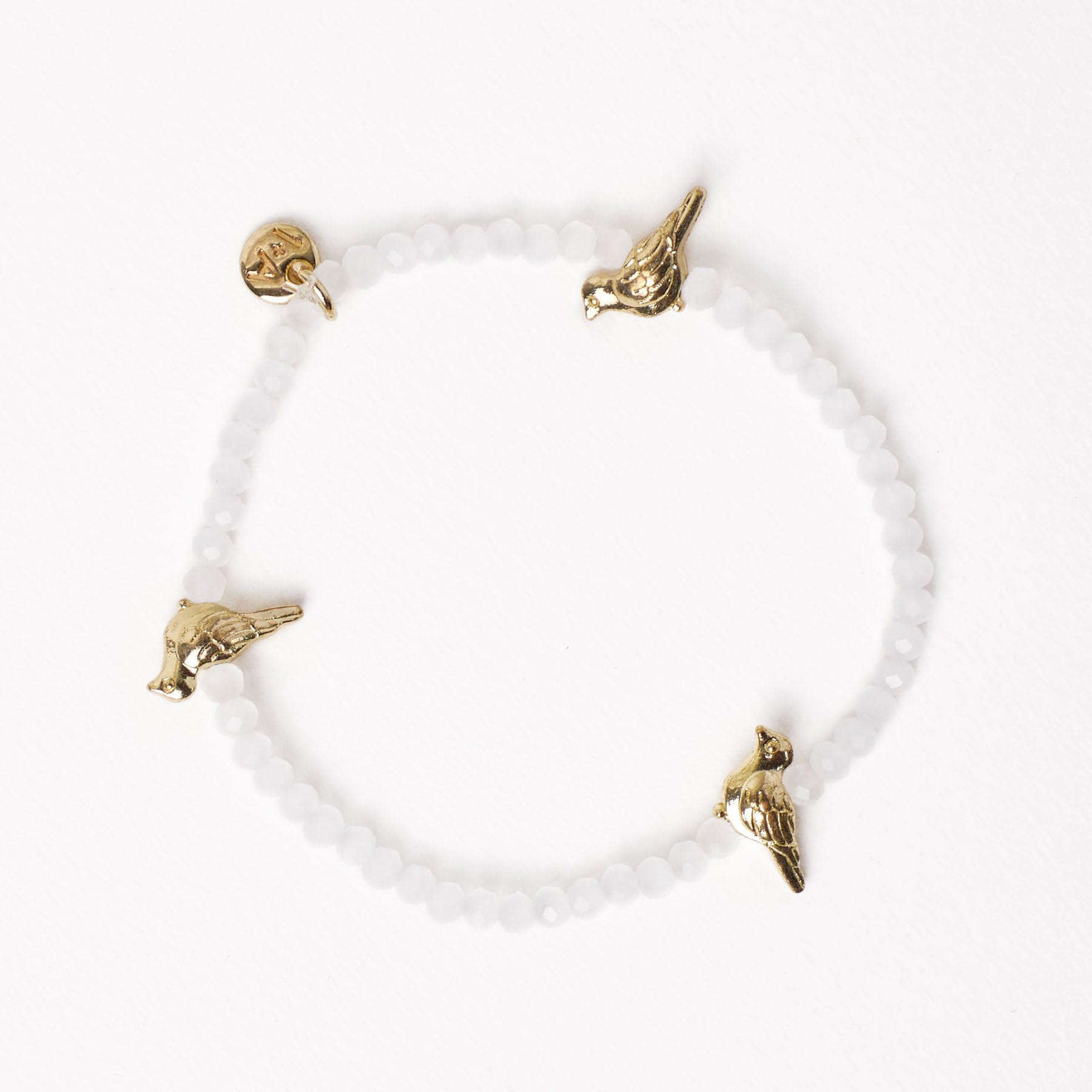 Janie Crystal Stretch Bracelet With Brass Bird Charms White Wholesale