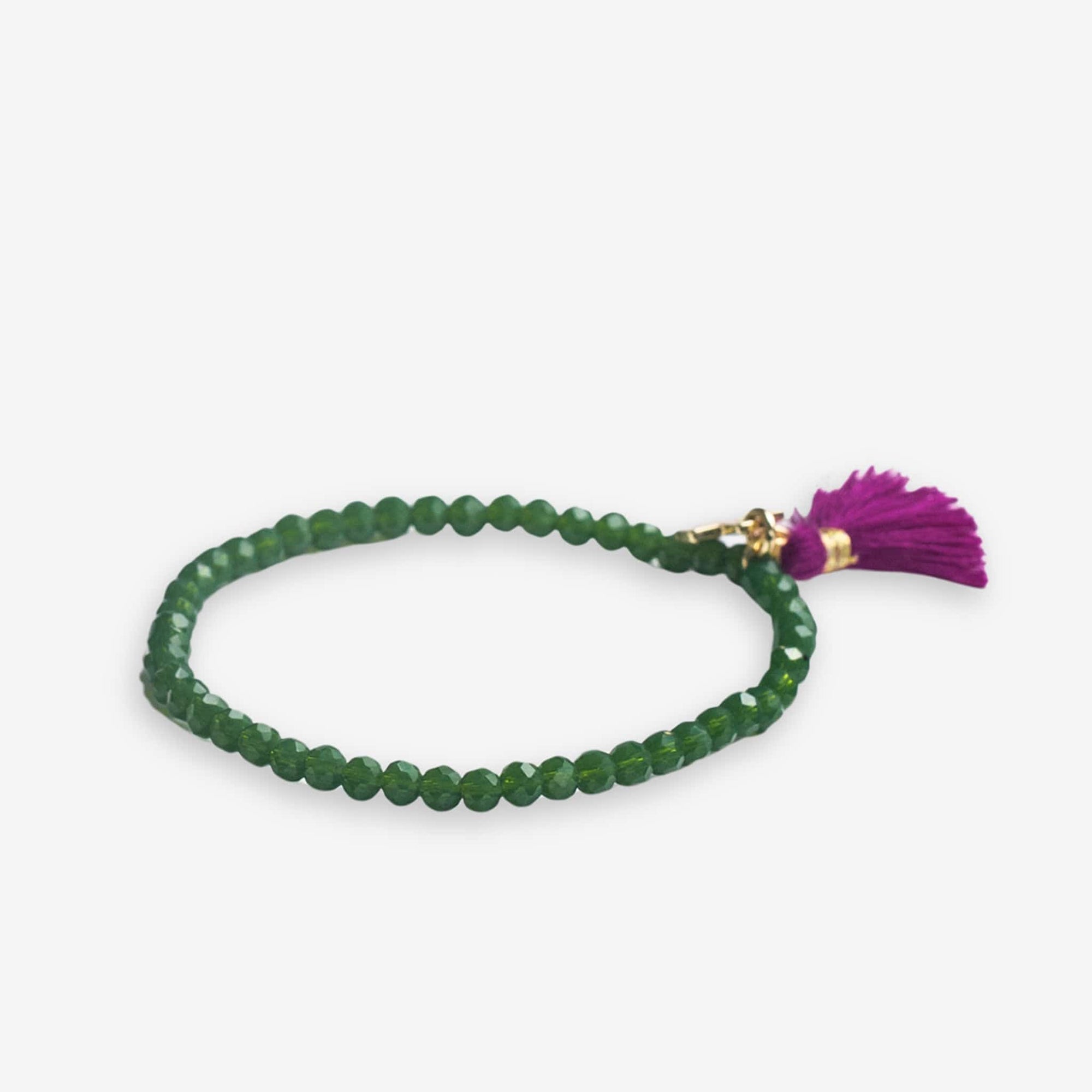 Patsy Solid Crystal Stretch Bracelet With Tassel Emerald Wholesale