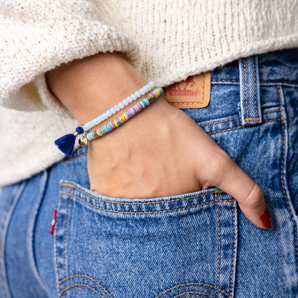 Patsy Solid Crystal Stretch Bracelet With Tassel Light Blue