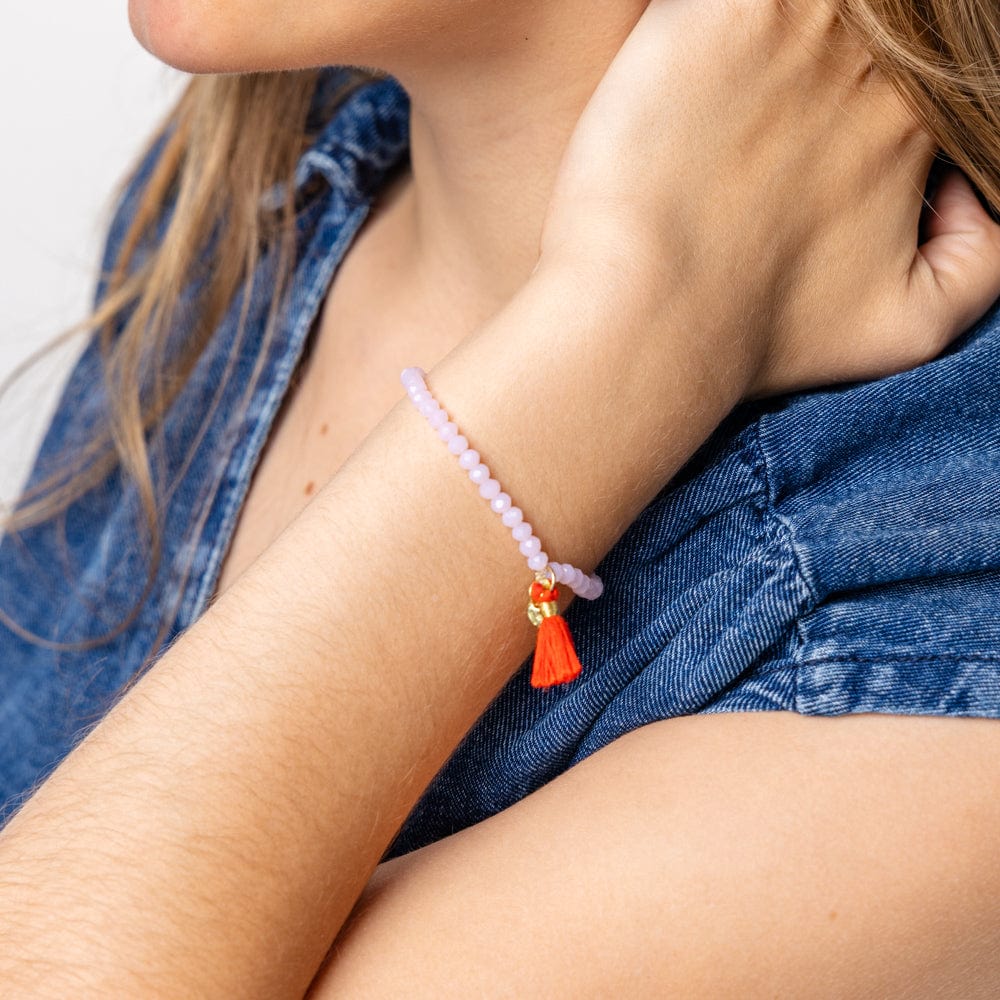 Patsy Solid Crystal Stretch Bracelet With Tassel Pink