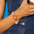 Game Day Crystal Stretch Bracelet With Tassel Orange + White Wholesale