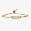 Goldie Gold Lurex Cord Friendship Bracelet with Brass Letters Adjustable Joy Wholesale