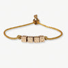 Goldie Gold Lurex Cord Friendship Bracelet with Brass Letters Adjustable XOXO Wholesale