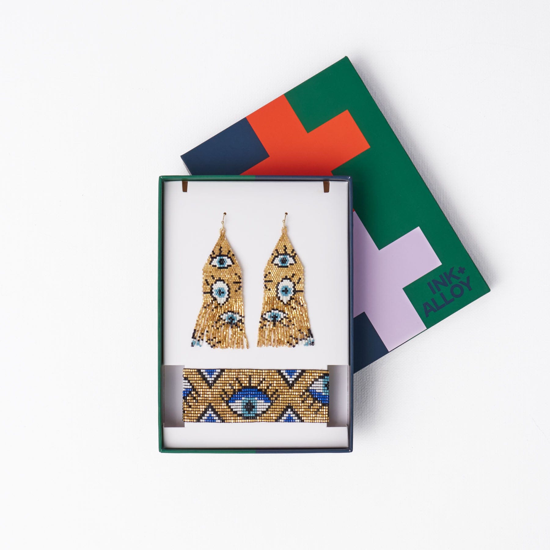 Delilah + Brooklyn Beaded Earrings and Bracelet Set Eye Print Gold Wholesale