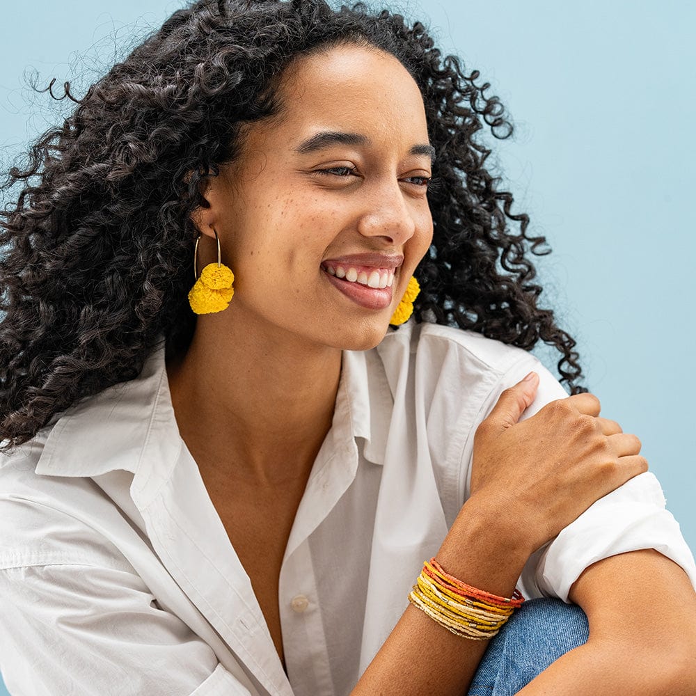 Rita Raffia Poms Hoop Earrings Yellow