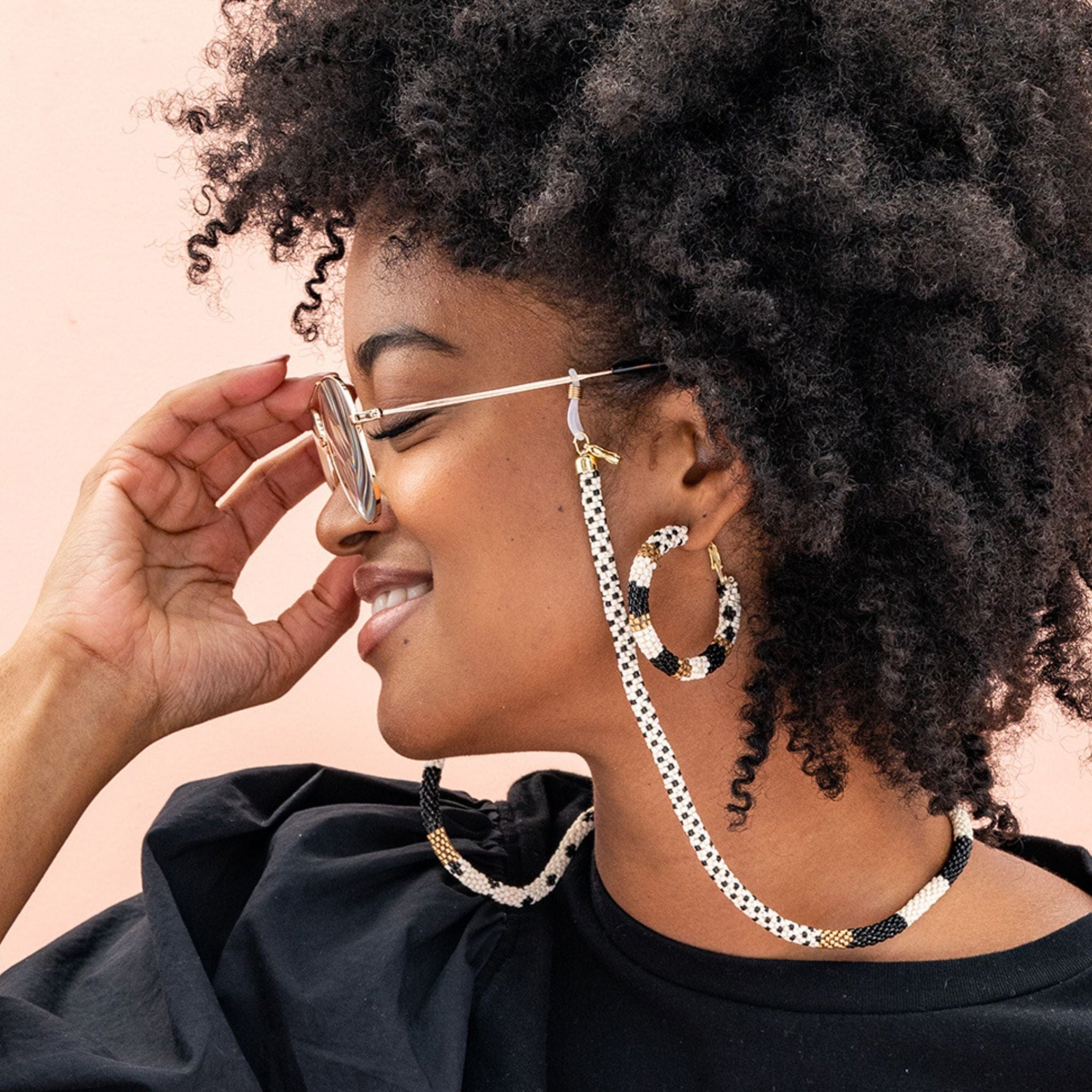 Dylan Cross And Stripe Beaded Eyeglass Chain Black/White Wholesale